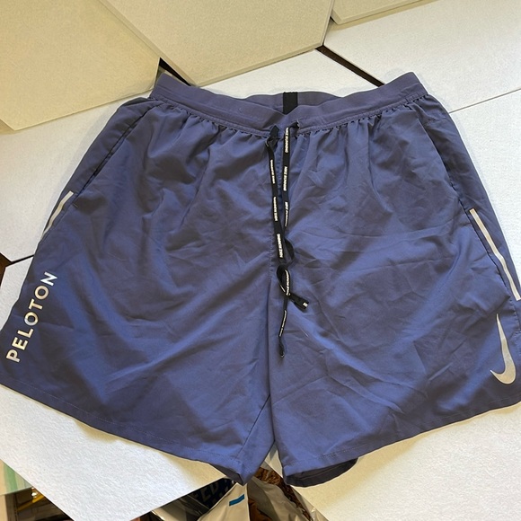 Nike Other - Nike X Peleton running dri-fit shorts size large 7 inch inseam denim blue